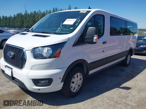 2024 Ford Transit Passenger XL z VIN 1FBAX2Y88RKA11307, wystawiony jako IAAI lot #42620775 z przebiegiem 13 624 mil mil oraz . Historia ofert i sprzedaży dostępna na DreamBid. Obrazek 2.