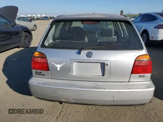 1998 Volkswagen Golf z VIN 3VWFA81H8WM251233, wystawiony jako Copart lot #42441795 z przebiegiem 122 969 mil mil oraz Czysty tytuł • Clean title. Historia ofert i sprzedaży dostępna na DreamBid. Obrazek 6.