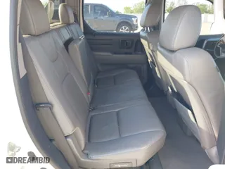 2010 Honda Ridgeline RTL with VIN 5FPYK1F54AB011339, listed as a IAAI auction lot 41983918 with 201,124 mi miles. Bid and sale history available at carsss.com. Image 8.