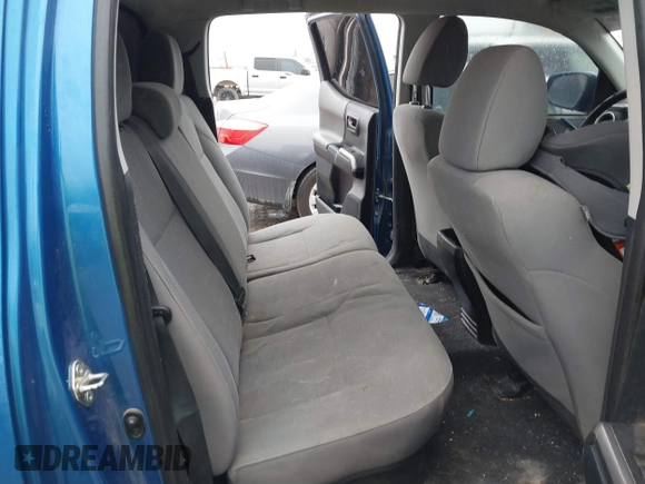 2016 Toyota Tacoma SR with VIN 5TFCZ5AN4GX013233, listed as a IAAI auction lot 41394610 with 142,099 mi miles and . Bid and sale history available at DreamBid. Image 8.