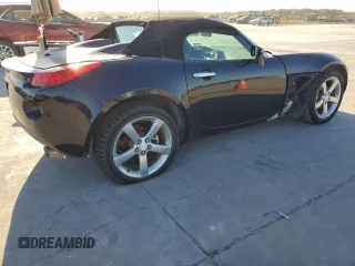 2007 Pontiac Solstice z VIN 1G2MB35B57Y141041, wystawiony jako Copart lot #70661994 z przebiegiem Nie podano mil oraz Czysty tytuł • Clean title. Historia ofert i sprzedaży dostępna na DreamBid. Obrazek 3.