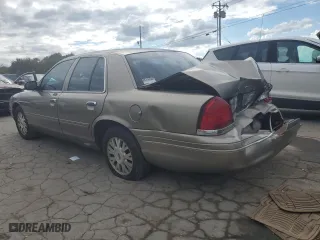 2005 Ford Crown Victoria LX with VIN 2FAFP74W95X147431, listed as a Copart auction lot 73487374 with 203,107 mi miles and Non Repairable. Bid and sale history available at carsss.com. Image 2.