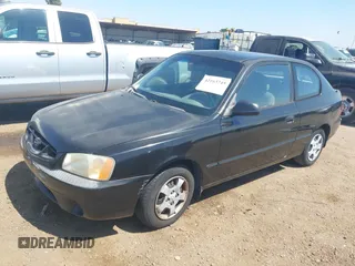 2001 Hyundai Accent GL z VIN KMHCG35C01U114597, wystawiony jako IAAI lot #42163745 z przebiegiem 203 310 mil mil oraz . Historia ofert i sprzedaży dostępna na DreamBid. Obrazek 2.