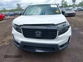2021 Honda Ridgeline Sport with VIN 5FPYK3F14MB005117, listed as a IAAI auction lot 42343059 with 58,862 mi miles and . Bid and sale history available at DreamBid. Image 12.
