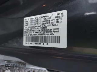2012 Honda Odyssey Touring with VIN 5FNRL5H98CB089871, listed as a IAAI auction lot 41351447 with 999,999 mi miles. Bid and sale history available at carsss.com. Image 9.