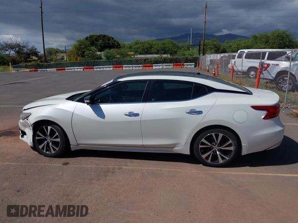 2017 Nissan Maxima SV z VIN 1N4AA6AP8HC446350, wystawiony jako IAAI lot #41852394 z przebiegiem 66 518 mil mil oraz . Historia ofert i sprzedaży dostępna na DreamBid. Obrazek 14.