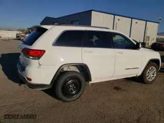 2021 Jeep Grand Cherokee Laredo X with VIN 1C4RJFAG2MC569455, listed as a Copart auction lot 66375044 with 57,943 mi miles and Salvage Title. Bid and sale history available at carsss.com. Image 3.