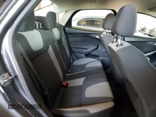 2012 Ford Focus SE with VIN 1FAHP3F28CL114572, listed as a Copart auction lot 63053035 with 142,994 mi miles and Salvage title. Bid and sale history available at DreamBid. Image 10.
