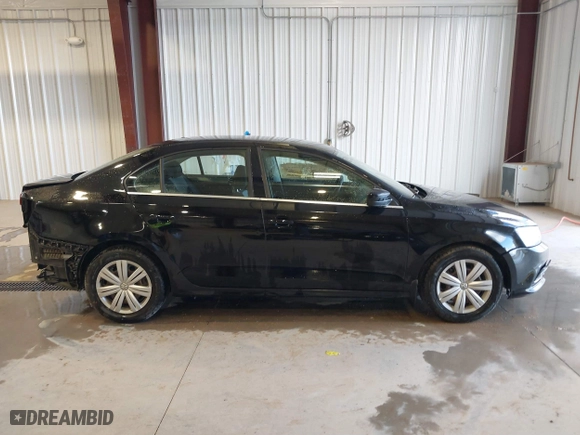 2017 Volkswagen Jetta 1.4T S with VIN 3VW167AJ5HM329706, listed as a IAAI auction lot 40801058 with 144,103 mi miles. Bid and sale history available at carsss.com. Image 14.