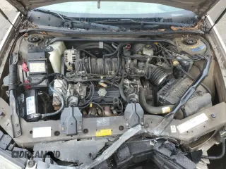 2001 Chevrolet Impala z VIN 2G1WF55K919219572, wystawiony jako Copart lot #81324224 z przebiegiem 129 445 mil mil oraz Szkoda całkowita • Salvage title. Historia ofert i sprzedaży dostępna na DreamBid. Obrazek 11.