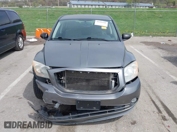 2012 Dodge Caliber SXT with VIN 1C3CDWDA6CD506019, listed as a IAAI auction lot 41999560 with 146,446 mi miles and . Bid and sale history available at DreamBid. Image 13.