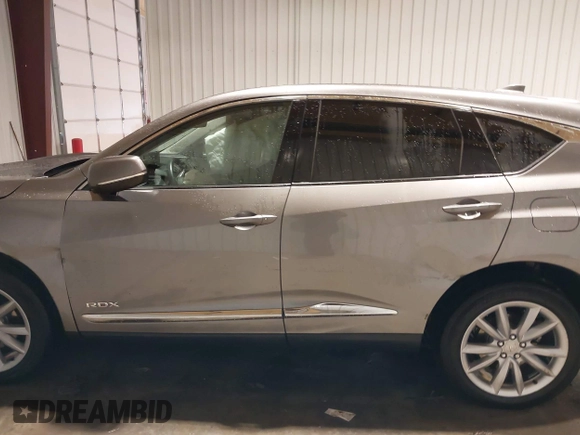 2023 Acura RDX with VIN 5J8TC2H33PL013401, listed as a IAAI auction lot 41619556 with 27,051 mi miles and . Bid and sale history available at DreamBid. Image 14.