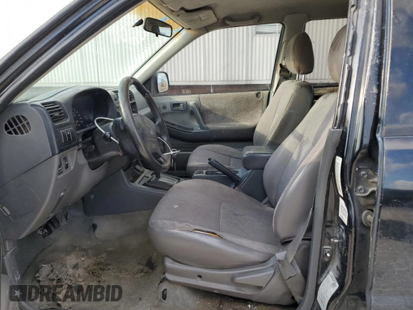 1999 Isuzu Rodeo S with VIN 4S2CK58W3X4362974, listed as a Copart auction lot 43155155 with 396,448 mi miles and Salvage Title. Bid and sale history available at DreamBid. Image 7.