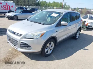 2014 Ford Escape SE with VIN 1FMCU9GX1EUB48145, listed as a IAAI auction lot 42111206 with 113,006 mi miles and . Bid and sale history available at carsss.com. Image 2.