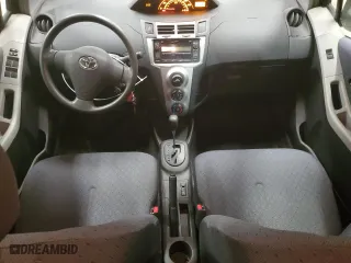 2009 Toyota Yaris with VIN JTDKT903495239209, listed as a Copart auction lot 49102305 with 147,845 mi miles and Salvage Title. Bid and sale history available at carsss.com. Image 8.
