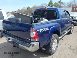 2014 Toyota Tacoma with VIN 3TMLU4EN0EM153558, listed as a IAAI auction lot 41964890 with 140,864 mi miles and . Bid and sale history available at DreamBid. Image 4.