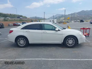 2007 Chrysler Sebring Touring with VIN 1C3LC56R07N536102, listed as a IAAI auction lot 41902390 with 203,037 mi miles and . Bid and sale history available at DreamBid. Image 13.
