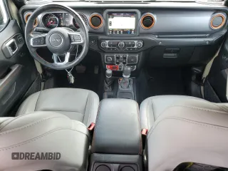 2020 Jeep Gladiator Mojave z VIN 1C6JJTEG9LL208154, wystawiony jako Copart lot #70474844 z przebiegiem 31 065 mil mil oraz Szkoda całkowita • Salvage title. Historia ofert i sprzedaży dostępna na DreamBid. Obrazek 8.