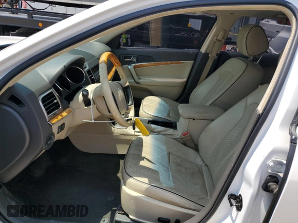 2012 Lincoln MKZ with VIN 3LNHL2GC5CR814277, listed as a Copart auction lot 60204615 with 137,526 mi miles and Salvage title. Bid and sale history available at DreamBid. Image 7.