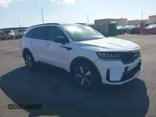 2023 Kia Sorento S with VIN 5XYRL4LC2PG235483, listed as a IAAI auction lot 41304494 with 9,660 mi miles and . Bid and sale history available at DreamBid. Image 1.