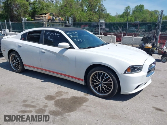 2014 Dodge Charger SE with VIN 2C3CDXBG2EH258886, listed as a IAAI auction lot 42104999 with 185,723 mi miles. Bid and sale history available at carsss.com. Image 1.