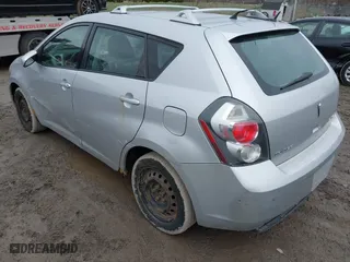 2009 Pontiac Vibe with VIN 5Y2SM67049Z443556, listed as a IAAI auction lot 41996105 with 190,061 mi miles. Bid and sale history available at carsss.com. Image 3.