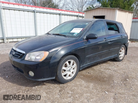 2005 Kia Spectra with VIN KNAFE161555093364, listed as a IAAI auction lot 41465930 with 190,769 mi miles. Bid and sale history available at carsss.com. Image 2.