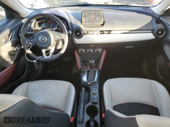 2018 Mazda CX-3 Grand Touring z VIN JM1DKFD75J0319224, wystawiony jako Copart lot #87504495 z przebiegiem 47 466 mil mil oraz Szkody całkowita. Historia ofert i sprzedaży dostępna na DreamBid. Obrazek 8.
