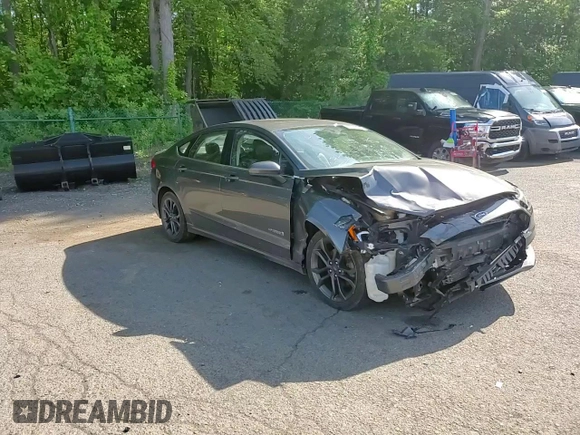 2018 Ford Fusion SE z VIN 3FA6P0LU9JR242443, wystawiony jako Copart lot #58049355 z przebiegiem 123 990 mil mil oraz Szkoda całkowita • Salvage title. Historia ofert i sprzedaży dostępna na DreamBid. Obrazek 14.