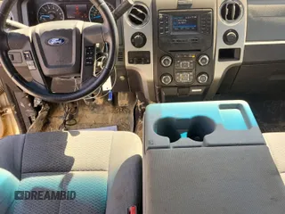 2014 Ford F-150 XL with VIN 1FTFW1ET1EKD55269, listed as a IAAI auction lot 42226627 with 214,662 mi miles and . Bid and sale history available at carsss.com. Image 64.