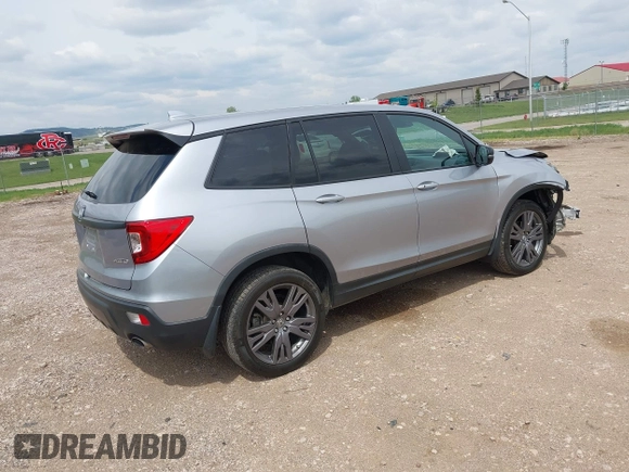 2020 Honda Passport EX-L with VIN 5FNYF8H59LB014260, listed as a IAAI auction lot 42274421 with 111,830 mi miles and . Bid and sale history available at DreamBid. Image 4.