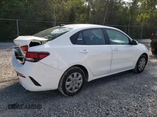 2023 Kia Rio S with VIN 3KPA24AD3PE597752, listed as a Copart auction lot 64836674 with 8,434 mi miles and Salvage Title. Bid and sale history available at carsss.com. Image 3.
