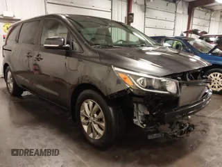 2020 Kia Sedona LX with VIN KNDMB5C17L6581477, listed as a IAAI auction lot 41705127 with 40,979 mi miles. Bid and sale history available at carsss.com. Image 1.