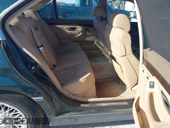 1998 BMW 7 Series 740il with VIN WBAGJ8323WDM13455, listed as a IAAI auction lot 41888636 with 1 mi miles. Bid and sale history available at carsss.com. Image 8.