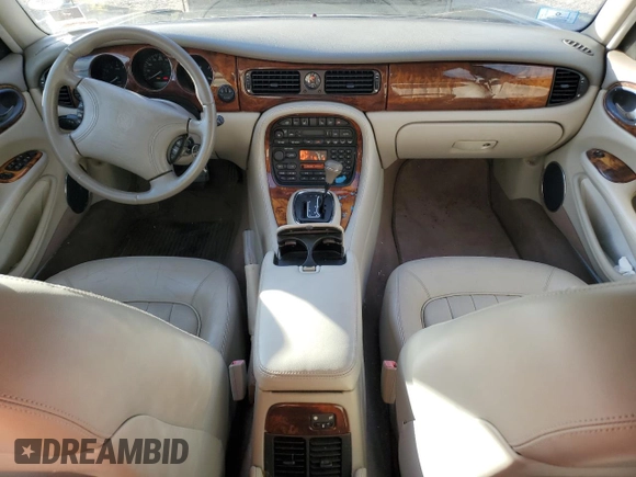 1998 Jaguar XJ with VIN SAJHX1248WC853422, listed as a Copart auction lot 80614724 with 76,269 mi miles and Non repairable. Bid and sale history available at DreamBid. Image 8.