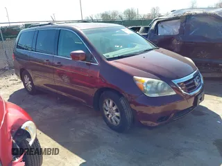 2009 Honda Odyssey EX-L with VIN 5FNRL38709B028980, listed as a IAAI auction lot 41989389 with 227,358 mi miles. Bid and sale history available at carsss.com. Image 1.