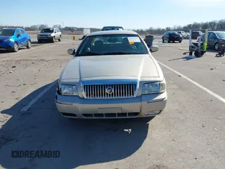 2010 Mercury Grand Marquis LS z VIN 2MEBM7FV4AX608503, wystawiony jako IAAI lot #41721726 z przebiegiem 172 907 mil mil oraz . Historia ofert i sprzedaży dostępna na DreamBid. Obrazek 12.