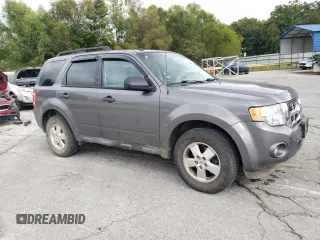 2012 Ford Escape XLT с VIN 1FMCU9DGXCKB34077, выставлен на аукционе Copart как лот 71502944 с пробегом 297 902 миль миль и Списание • Salvage title. История ставок и продаж доступна на DreamBid. Изображение 4.