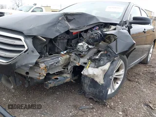 2014 Ford Taurus SEL with VIN 1FAHP2E80EG114996, listed as a IAAI auction lot 41908983 with 136,864 mi miles. Bid and sale history available at carsss.com. Image 6.