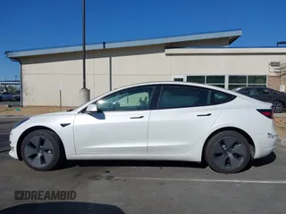 2023 Tesla Model 3 with VIN 5YJ3E1EA6PF411940, listed as a IAAI auction lot 41829537 with 32,877 mi miles and . Bid and sale history available at carsss.com. Image 13.