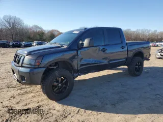 2015 Nissan Titan Pro-4X with VIN 1N6BA0EC9FN506623, listed as a Copart auction lot 86212404 with 137,170 mi miles and Salvage title. Bid and sale history available at DreamBid. Image 1.