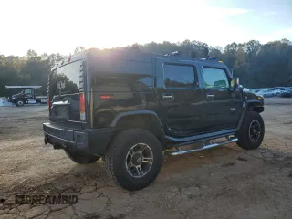 2004 Hummer H2 with VIN 5GRGN23U54H108629, listed as a Copart auction lot 78060184 with 227,696 mi miles and Salvage Title. Bid and sale history available at carsss.com. Image 3.