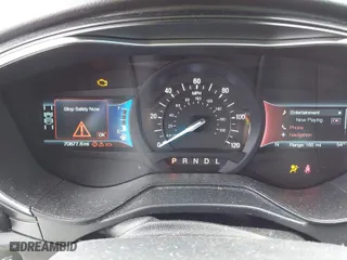 2019 Ford Fusion Hybrid Titanium with VIN 3FA6P0RU8KR273062, listed as a IAAI auction lot 41814102 with 70,877 mi miles. Bid and sale history available at carsss.com. Image 7.