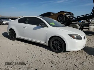 2009 Scion tC z VIN JTKDE167190282832, wystawiony jako Copart lot #53359705 z przebiegiem 227 341 mil mil oraz Szkoda całkowita • Salvage title. Historia ofert i sprzedaży dostępna na DreamBid. Obrazek 4.