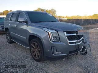 2018 Cadillac Escalade Luxury z VIN 1GYS3BKJ1JR307525, wystawiony jako IAAI lot #41800377 z przebiegiem 171 484 mil mil oraz . Historia ofert i sprzedaży dostępna na DreamBid. Obrazek 1.