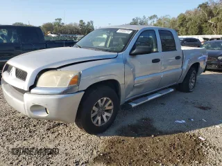 2008 Mitsubishi Raider LS with VIN 1Z7HT28KX8S620452, listed as a Copart auction lot 45400215 with 179,735 mi miles and Salvage Title. Bid and sale history available at carsss.com. Image 1.