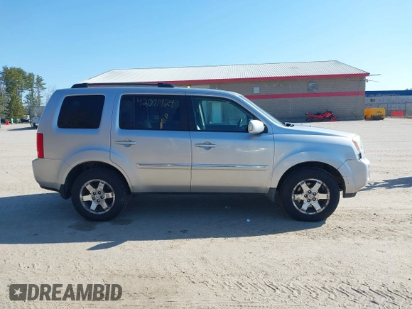 2011 Honda Pilot Touring with VIN 5FNYF4H96BB012122, listed as a IAAI auction lot 42071924 with 211,000 mi miles. Bid and sale history available at carsss.com. Image 13.