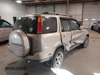 2000 Honda CR-V SE with VIN JHLRD1879YC037127, listed as a IAAI auction lot 41285624 with 246,170 mi miles. Bid and sale history available at carsss.com. Image 4.