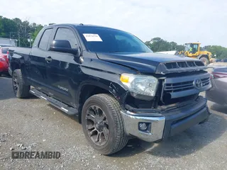 2014 Toyota Tundra SR with VIN 5TFRM5F17EX079576, listed as a IAAI auction lot 42476134 with 154,331 mi miles and . Bid and sale history available at DreamBid. Image 1.
