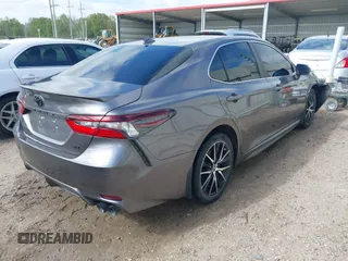 2022 Toyota Camry SE with VIN 4T1T11AK3NU619882, listed as a IAAI auction lot 41866164 with 60,620 mi miles and . Bid and sale history available at DreamBid. Image 4.